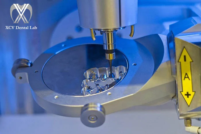 Close-up of CORiTEC 350i PRO+ dry and wet milling chamber for versatile dental production workflows